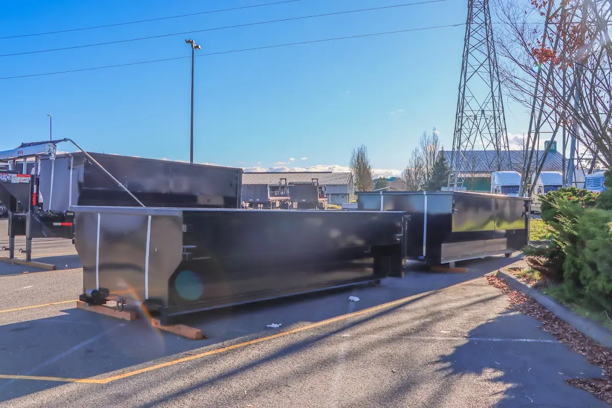 Roll-off dumpster ready for waste disposal at job site for 2 Yard Dumpster Rental in Dunwoody